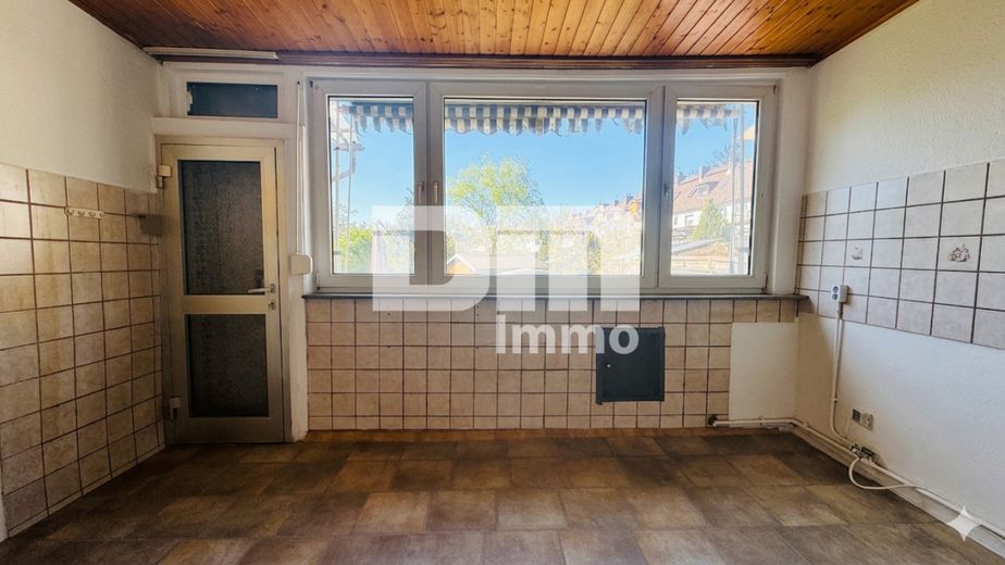 (R)eserveerd! Compact rijtjeshuis op een prominente locatie met tuin – EG Küche / Zugang Gartenbereich