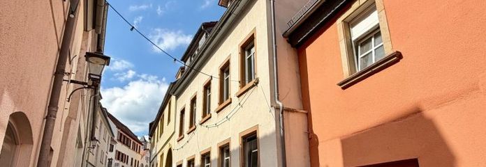 EUPORA® Immobilien: Mehrfamilienhaus mit Innenhof im Zentrum von Kirchheimbolanden.