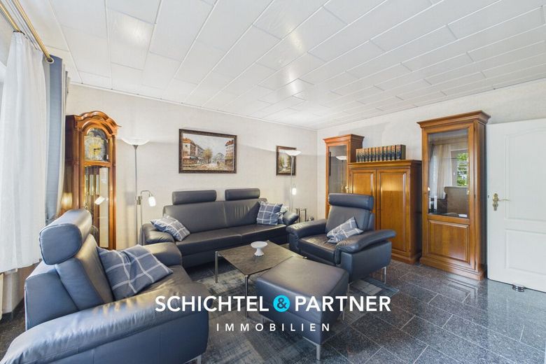 Achim-Zentrum| Freistehendes Ein-  Zweifamilienhaus mit Garten – S&amp;P | Wohnzimmer