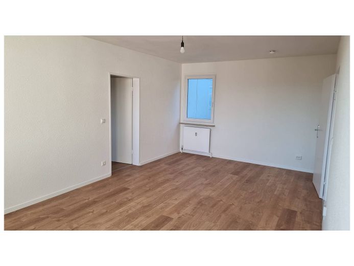 Appartamento di 3 locali ben suddiviso con balcone – Ansicht II: Wohnzimmer