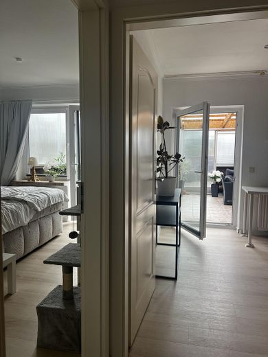 SENZA PROVVIGIONE Casa trifamiliare con vista sul fiordo e interessanti redditi da locazione, circa 300 m2 di superficie abitabile – 1. OG-Wohnung 
