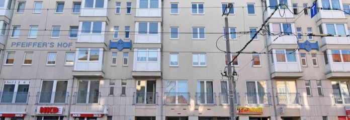 KLEINE FLÄCHE. KLARE PERSPEKTIVE. – Vermietete Kapitalanlage mit Stellplatz in „Pfeiffer’s Hof“