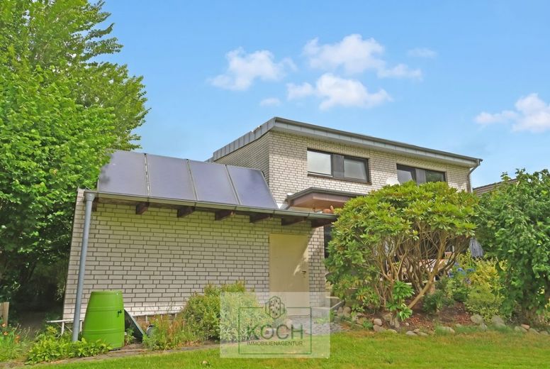 Individuelles Architektenhaus mit schönem Grundstück in ruhiger Lage – Gartenansicht'
