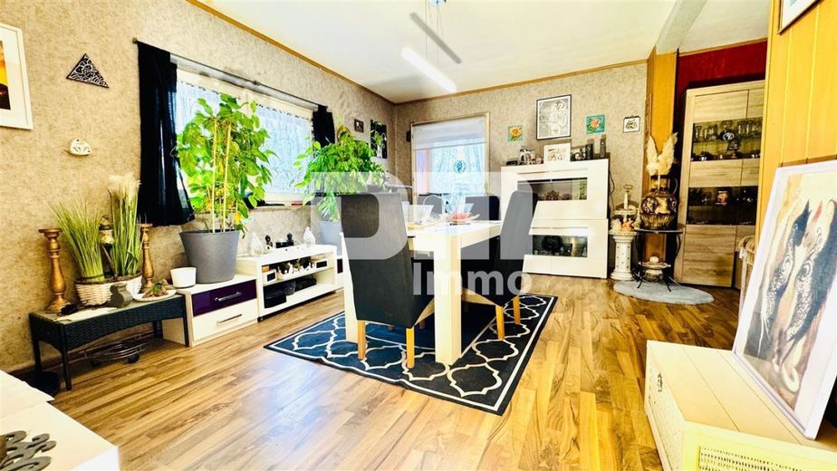 Schöne Doppelhaushälfte in schöner Wohnlage mit Panoramablick, Gartenbereich und Garage – EG Wohn / Esszimmer