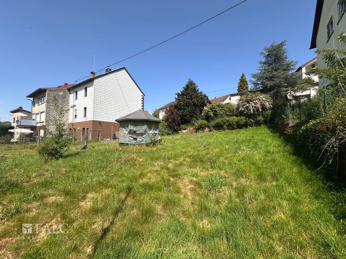 Preiswertes Familienhaus plus Baugrundstück! – Garten