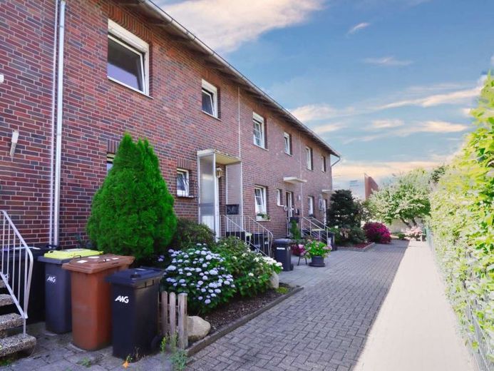 Reihenmittelhaus mit Garage und Potenzial in innenstadtnaher Wohnlage von Diepholz – Foto 1