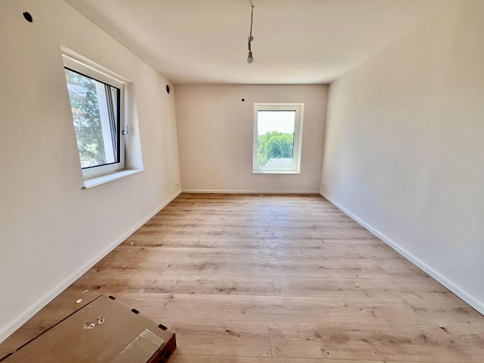 Erstbezug Möhringen: Stilvolle 3,5-Zi.-Etagenwohnung mit Kamin, Balkon & Garten – Arbeits- oder Kinderzimmer