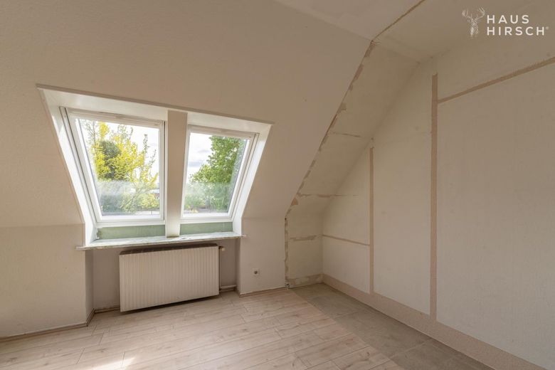 Doppelhaushälfte mit 5 Zimmern auf 133 m² in Boostedt zu kaufen – Schlafzimmer DG