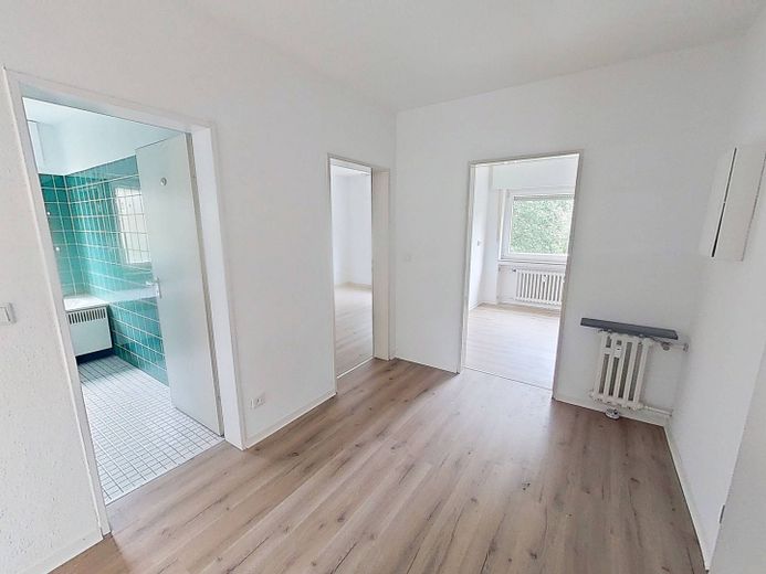 Luminoso bilocale ben distribuito con BALCONE e bagno con vasca a Bielefeld-Senne – Ansicht I: Flur