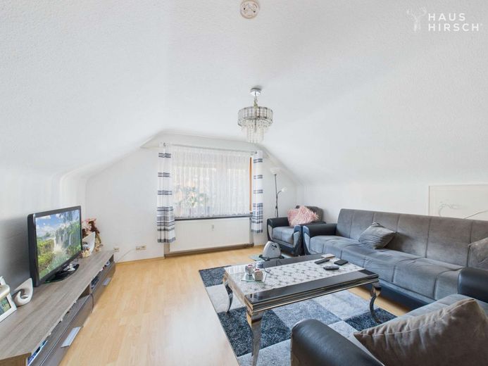 Kapitalanlage mit Potenzial: Wohn- und Geschäftshaus in Geislingen a.d. Steige – Wohnzimmer DG