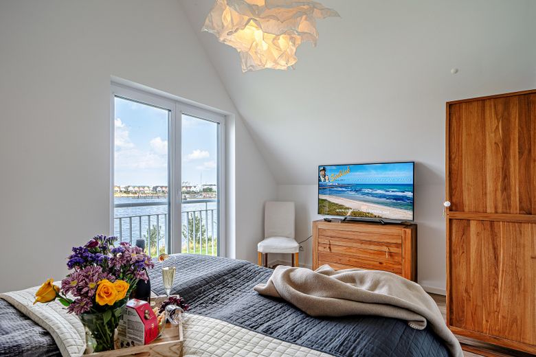 Freistehendes Ferienhaus im Ostseeressort Olpenitz Kappeln, Wasserlage – Schlafzimmer