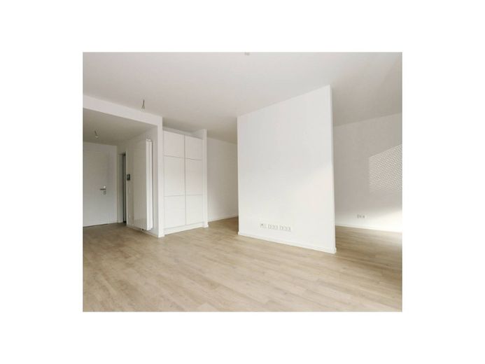 Komfortable 1,1 Zimmer Wohnung mit Einbauküche und Balkon – Ansicht II: Wohn - und Esszim…