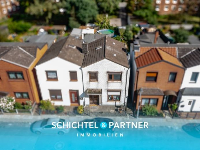 Oslebshausen | End-of-terrace house in need of renovation with garden – Photo 1