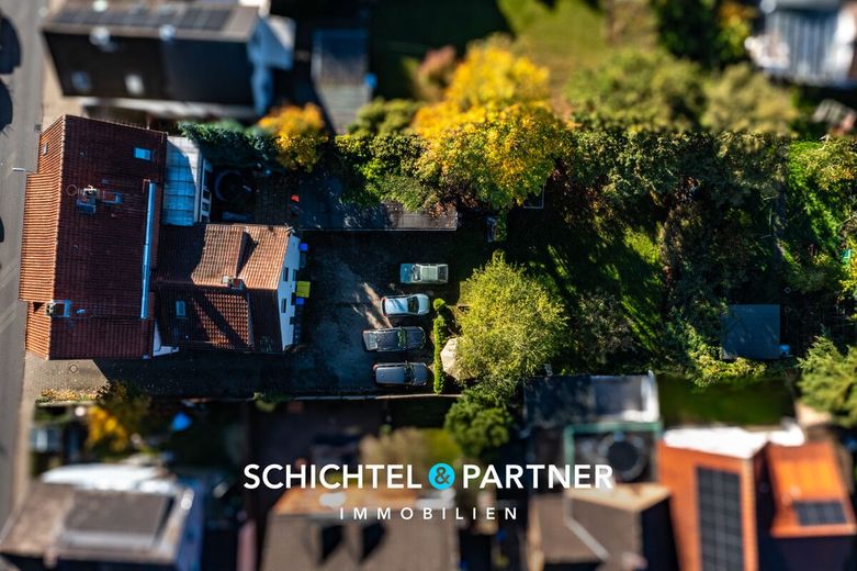 Vegesack | Mehrfamilienhaus mit Gewerbe, Garagen und großem Grundstück – S&amp;P | Grundstücksansicht