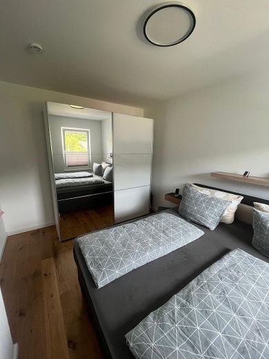 Attico in un edificio di nuova costruzione, seconda locazione – Schlafzimmer