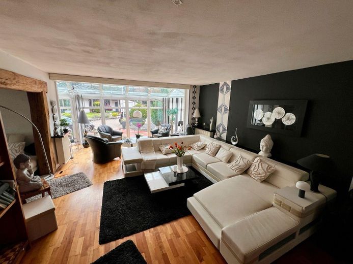 Wohnzimmer mit Wintergarten