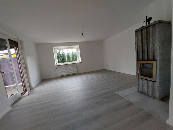 Wohnzimmer mit Kamin 1 OG