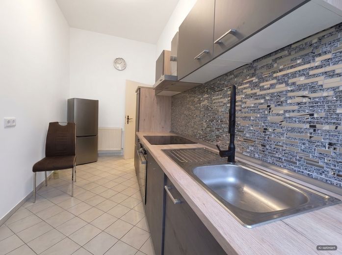 Schöne 2-Zimmer-Wohnung mit Einbauküche im Erdgeschoss – Foto 4