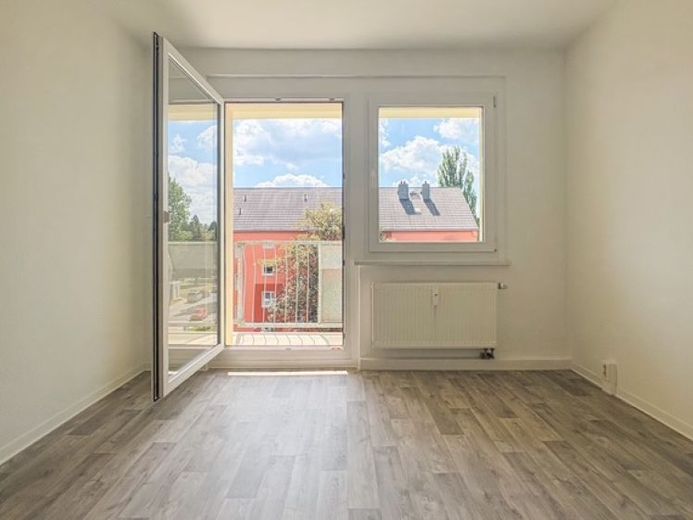 Raus aus dem Trubel: Helle Wohnung im grünen Wohnumfeld! – Foto 1
