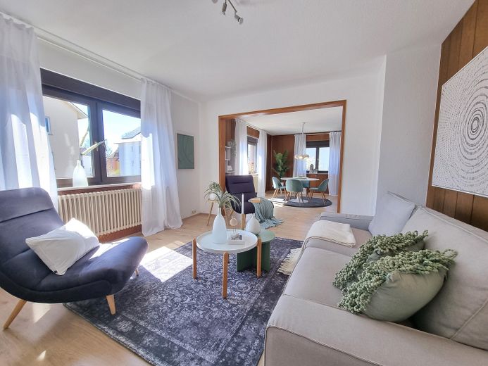 Großzügige 5,5-Zimmer-Maisonette mit Hauscharakter und viel Platz für die Familie – Wohnzimmer