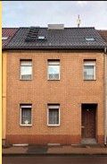 Sanierungsbedürftiges Reihenmittelhaus mit Nebengelass und Garage – Foto 1