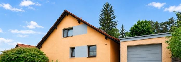 Room for Generations: Well-Maintained Two-Family House with Inviting Garden in Quiet Forest-Edge Location