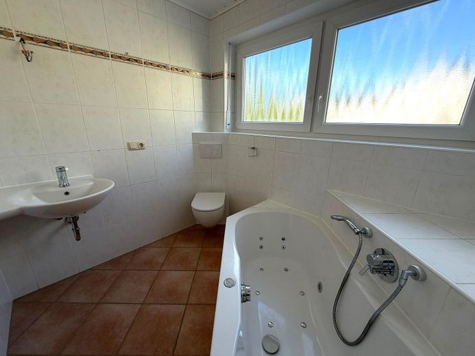 Bonita casa adosada con garaje y jardín * en Schweinfurt – Bad
