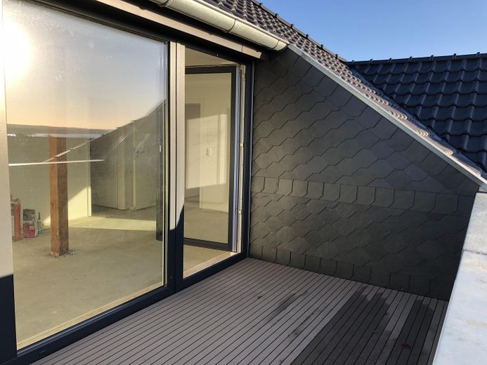 Exklusive Dachgeschosswohnung mit 2 Zimmern sowie Loggia in bevorzugter Lage von Plön – Loggia