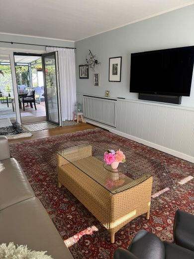 Exclusive country house near Sylt with ambiance & flair – Wohnbereich mit Wintergarten