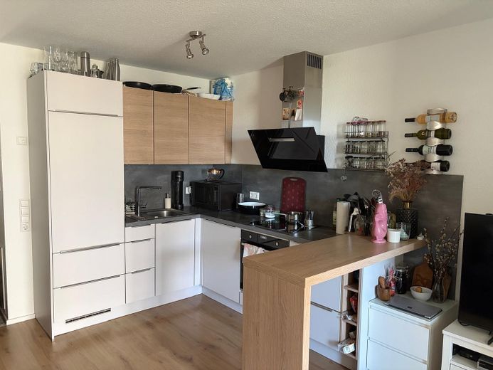 Wohnzimmer mit Küche