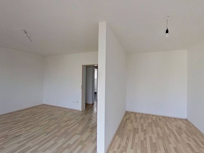 Gut geschnittene 1-Zimmer-Wohnung mit Balkon und Tageslichtbad – Ansicht III: Wohnzimmer