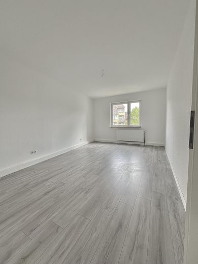 Bel appartement de 3 pièces avec balcon à Hagen – libre à partir du 01.09. – Wohnzimmer