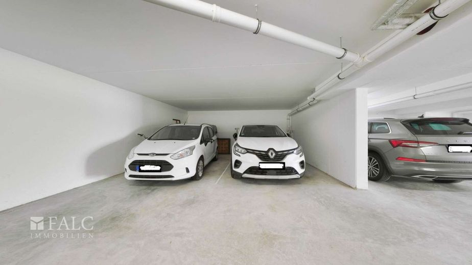 Moderne 4-Zimmer-Wohnung mit Balkon, Aufzug und Tiefgaragenstellplatz – Tiefgarage