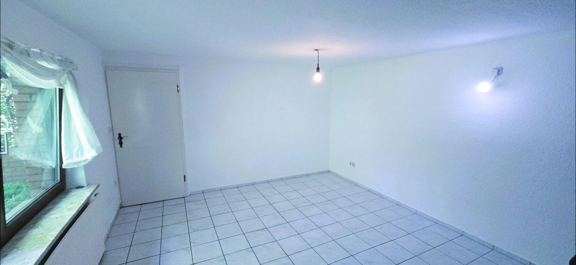 Mietobjekt 1. Wohnzimmer