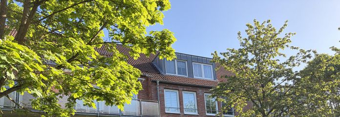 Kernsanierte helle und ruhige Wohnung mit Balkon ins Grüne – Gartenansicht