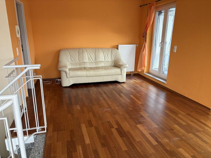 3 Zimmerwohnung mit 3 Tiefgaragenplätzen und 4 Balkonen – Wohnzimmer, jetzt leer