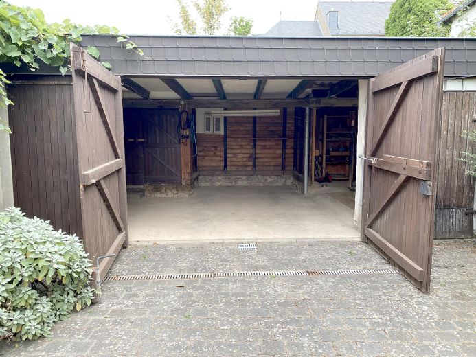 Idyllischer Rückzugsort: Charmantes Bruchsteinhaus mit toskanischem Innenhof – Garage/Projektraum