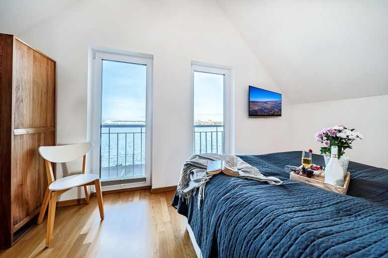 Semi-detached house in the Baltic Sea resort Olpenitz Kappeln, waterside location with large plot – Schlafzimmer Eltern