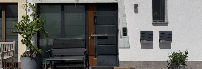 Familienfreundliche Eigentumswohnung auf 2 Etagen mit Hauscharakter und eigenem Garten – Eingang