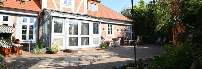 Terrasse mit Wintergarten