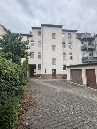 Edificio plurifamiliare con grande corpo posteriore e due garage – Vorderhaus Rückseite u. Garage