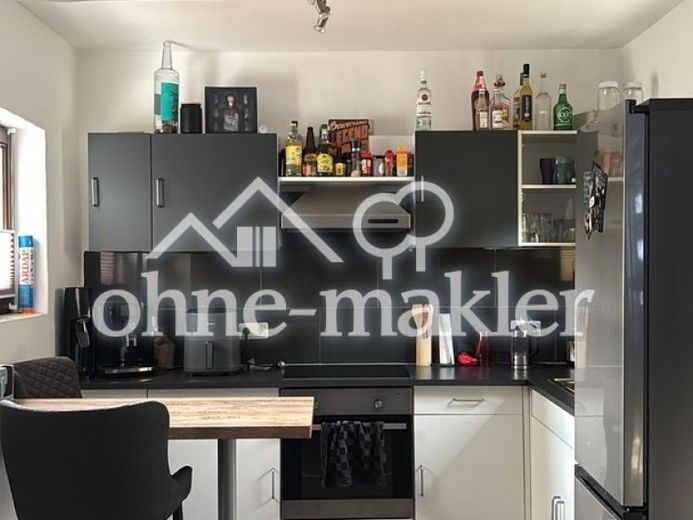 Appartement de plain-pied de 2,5 pièces avec cuisine, salle de bains, terrasse et buanderie – Photo 1