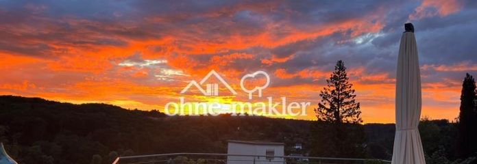 Esclusivo appartamento con terrazza, vista incantevole sul verde, ampie vetrate e garage