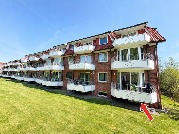 Urlaub beginnt hier - helle Ferien-Wohnung mit 
Balkon &amp; Sauna an der Nordsee in Dorum-Neufeld – Ruhige Balkonlage für entspannte Momente