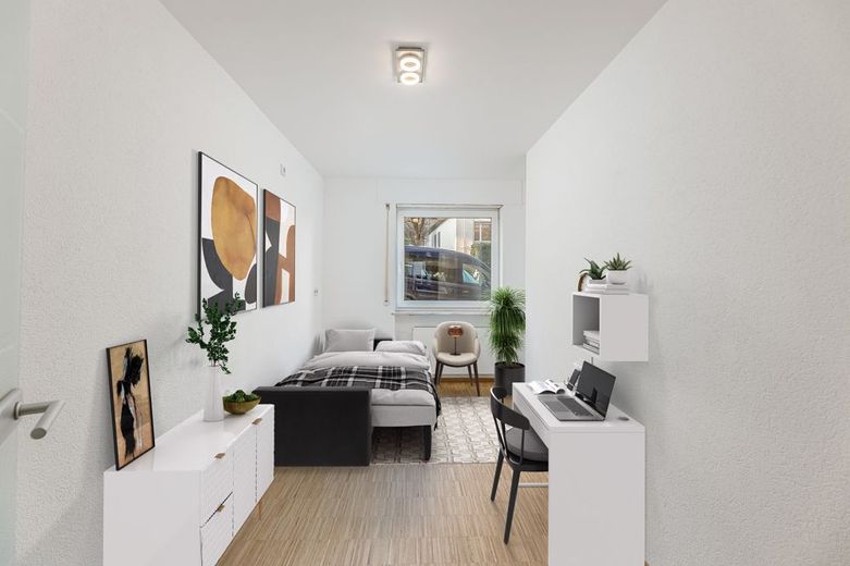 Attraktive Investmentchance: Frisch renoviert, bezugsfrei und  WG-geeignet in exzellenter Lage – Schlafzimmer 1 möbliert