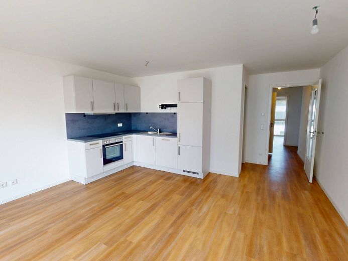 Modern wonen: lichtrijk nieuwbouwappartement met 3 kamers, balkon en inbouwkeuken – Ansicht III: Wohn- und Esszim…