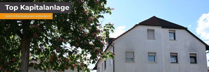 Gewerbe- + Wohnhaus