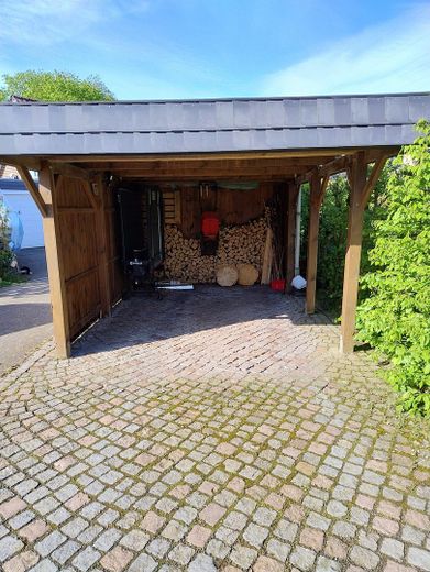 Carport mit Werkstatt dahinter