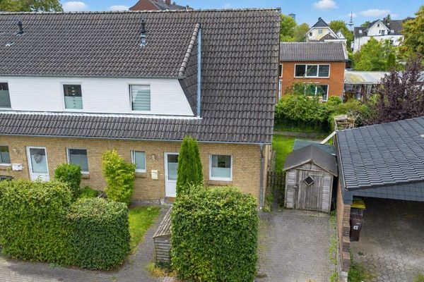 Familienfreundliches Reihenendhaus mit Garten und Fußbodenheizung in zentraler Lage