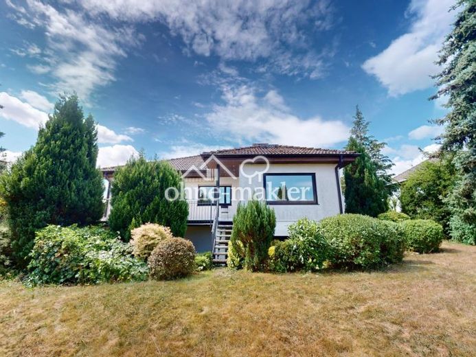 Bungalow mit Taunusblick, barrierearmem Wohnen und vielseitig nutzbarem Untergeschoss – Foto 1